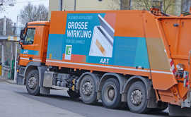 Werbung für Briefkastenaufkleber auf A.R.T-Fahrzeug