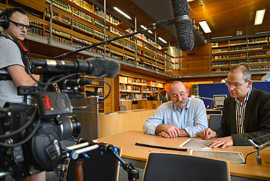 Foto: Dreharbeiten mit Horst Lichter im Lesesaal der Stadtbibliothek.