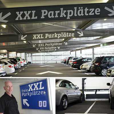 Zahlreiche extra breite Parkplätze befinden sich im Parkhaus Hauptmarkt. Albrecht Classen, Prokurist der SWT-Parken GmbH (unten links),  zeigt ihre Beliebtheit: Alle sind belegt. Fotomontage: SWT