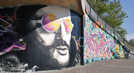 In dem Kunststadtführer werden mehrere Graffiti vorgestellt, darunter an der Unterführung im Messepark. Foto: Kunstakademie