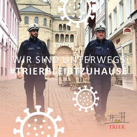 Pascal Reichert und Gerd Gödert (Kommunaler Vollzugsdienst, v. l.) weisen im neuen Instagram-Account der Stadt Trier auf die Kontrollen der Kontaktbeschränkung hin.