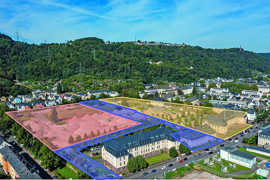 Luftbild des Geländes der ehemaligen Jägerkaserne. Die Bauabschnitte der künftigen Entwicklung siond farblich eingezeichnet.